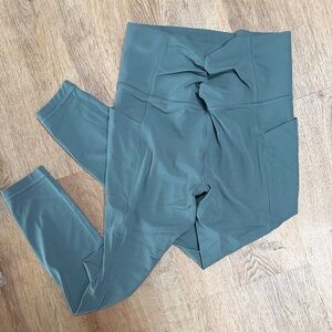 ATHLETA SALUTATION STASH CINCH 7/8 tight